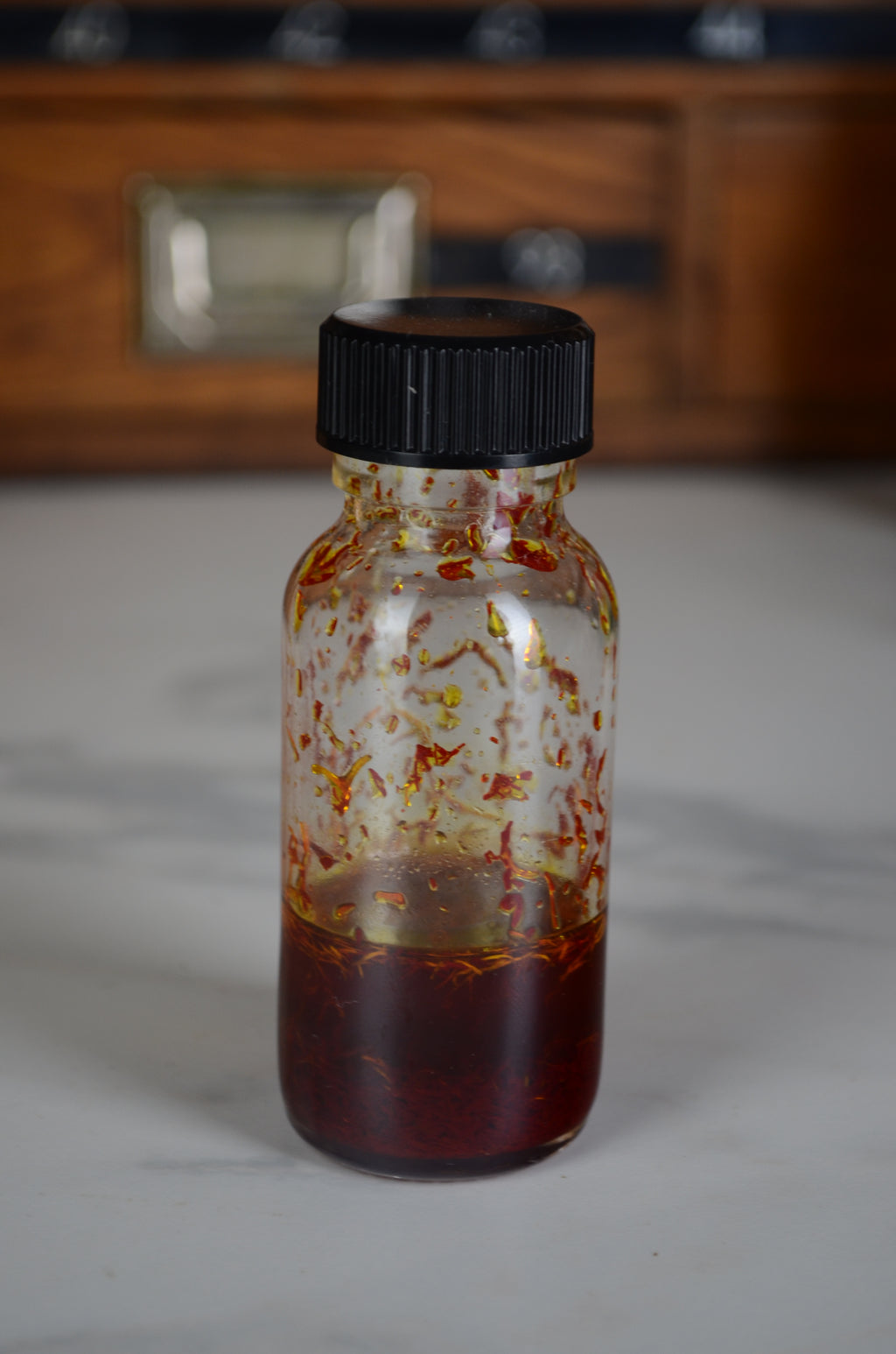 Azafran español macerado en Oud Kynam Chino